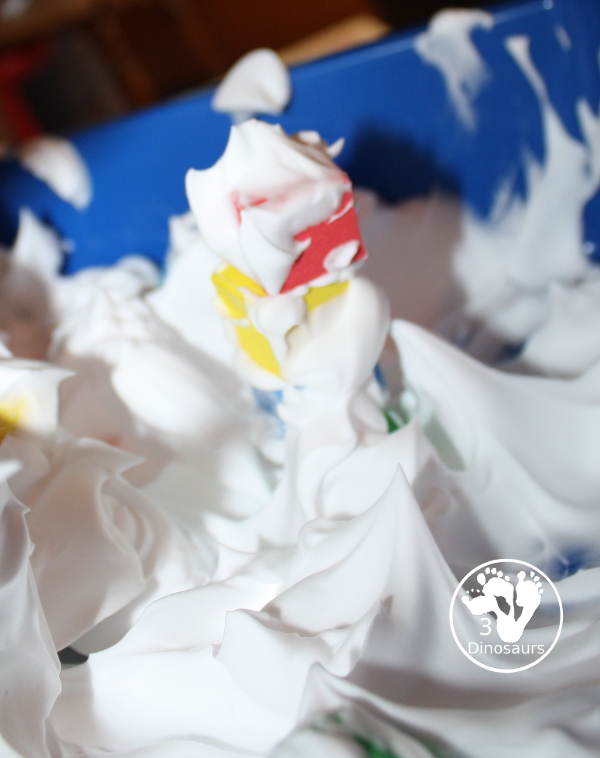 Shaving Cream and Foam Blocks Sensory Play - an easy to set up sensory play that can be done inside or outside with kids. It takes just a minute to set up with the shaving cream being the longest part. This is great for kids in preschool, prek, and kindergarten.  3Dinosaurs.com