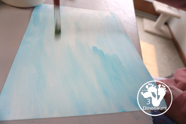 Snowflake Q-Tip Painting - a fun mixed art project that kids can do to paint snowflakes - 3Dinosaurs.com