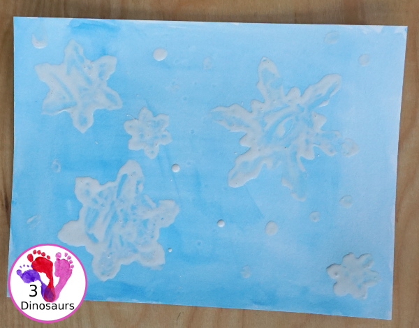Snowflake Q-Tip Painting - a fun mixed art project that kids can do to paint snowflakes - 3Dinosaurs.com