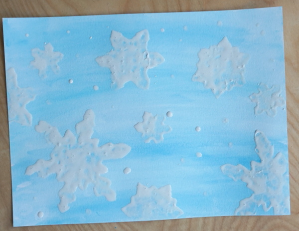 Snowflake Q-Tip Painting - a fun mixed art project that kids can do to paint snowflakes - 3Dinosaurs.com