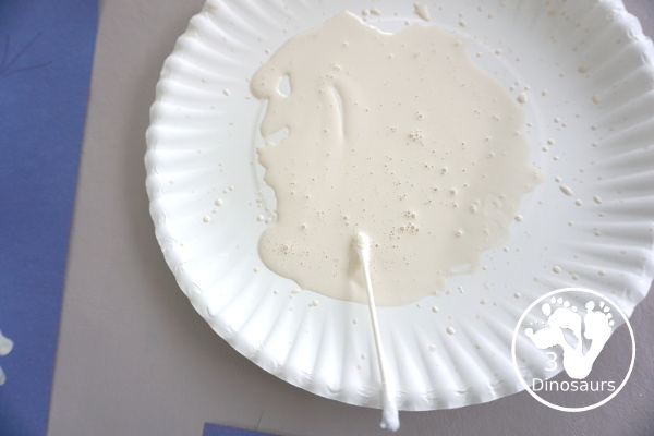 Q-Tip Snowflakes - a fun fine motor craft you can do to make a snowflake and do fine motor work at the same time - 3Dinosaurs.com