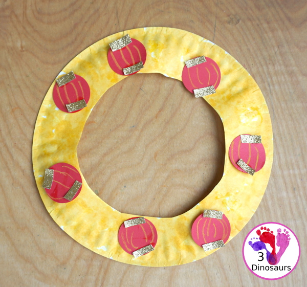 Lunar New Year Wreath Craft for kids - a simple paper plate wreath you can make with kids for the lunar new year and Chinese New year with a red lantern theme - 3Dinosaurs.com