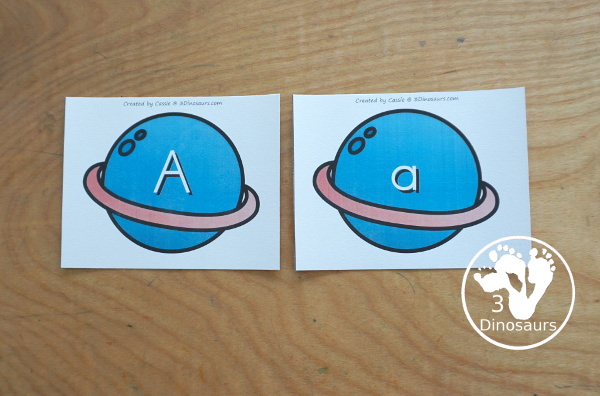 Free Space ABC Planet and Moon Matching Printable with matching uppercase and lowercase letters for kids with a planet with the letter and four moons for each planet. A great hands-on letter activity for kids - 3Dinosaurs.com