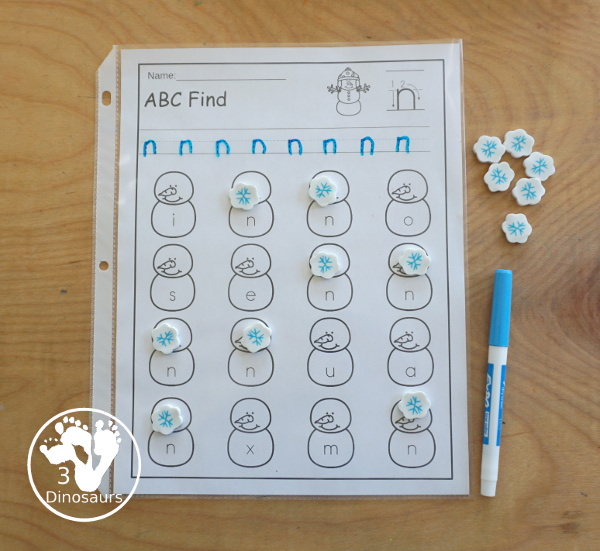 Snowman ABC Letter Find Printable - with all 26 letters of the alphabet with tracing the letters and finding the letters on the snowmen. Works great for a winter alphabet printable - 3Dinosaurs.com