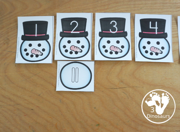  Snowman Number Sense Game from 1 to 20 with matching several different number types to the numerical number including tally marks, dominos, number word, ten frames, and tens and ones to build a snowman and fun game boards and worksheets to use with the games - 3Dinosaurs.com