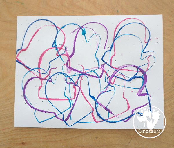 Mitten Cookie Cutter Stamp Painting - a simple winter painting that kids can do with a mitten cookie cutter. - 3Dinosaurs.com