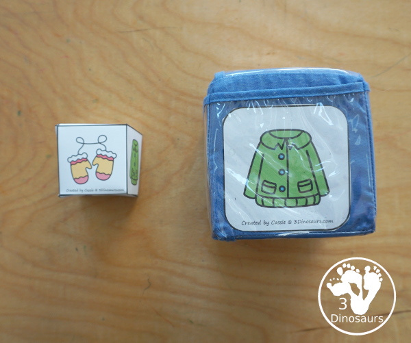 Winter Roll & Graph With Trace Letters, Numbers & Shapes with a folding die and cube die with a graphing sheet, graphing with tracing numbers, graphing with tracing letters and graphing with tracing shapes. All with a fun winter clothes theme for winter for prek and kindergarten - 3Dinosaurs.com