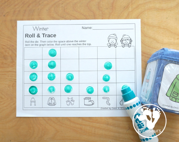 Winter Roll & Graph With Trace Letters, Numbers & Shapes with a folding die and cube die with a graphing sheet, graphing with tracing numbers, graphing with tracing letters and graphing with tracing shapes. All with a fun winter clothes theme for winter for prek and kindergarten - 3Dinosaurs.com