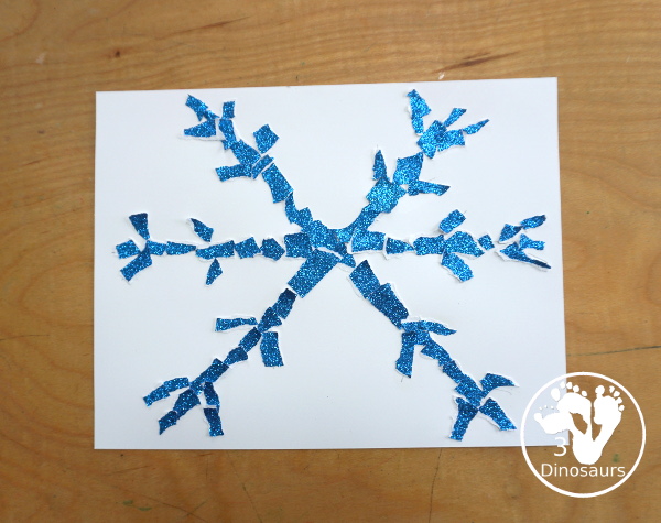 Torn Paper Glitter Snowflake Craft - a fun torn paper craft to make snowflakes out of glitter paper a fun winter craft for kids. - 3Dinosaurs.com