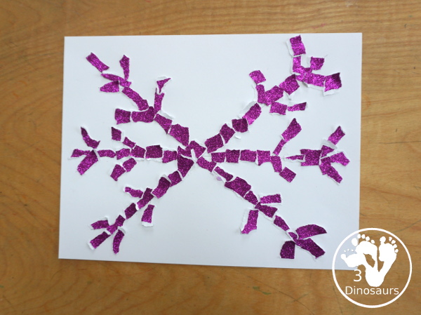 Torn Paper Glitter Snowflake Craft - a fun torn paper craft to make snowflakes out of glitter paper a fun winter craft for kids. - 3Dinosaurs.com