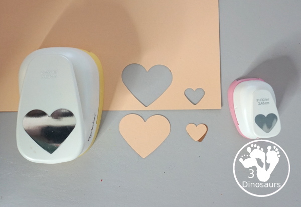 Black History Month Heart Wreath Craft - a simple wreath made with hearts of different shades of skin color for Black history month or Martin Luther King Jr Day. An easy craft to do with kids. - 3Dinosaurs.com