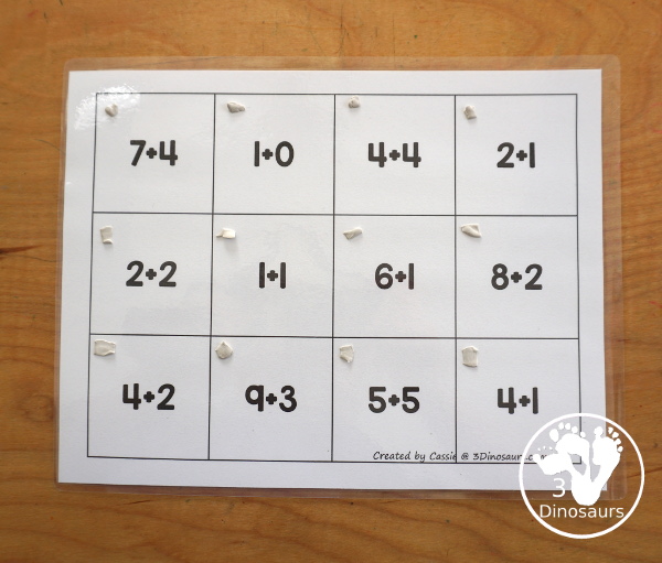 Free Hockey Addition Puzzle Printable - a fun 12 piece puzzle with addition from 1 to 12 on the puzzle mat with matching puzzle pieces. A fun winter sports theme for an addition center. - 3Dinosaurs.com