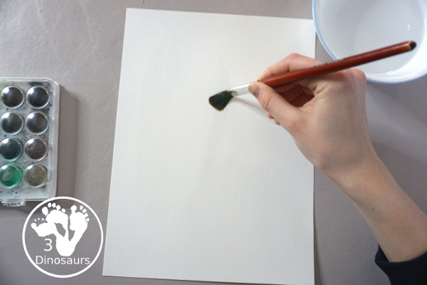 Winter Tree Painting Craft For Kids a fun mixed watercolor and q-tip painting winter tree for kids. A fun winter painting idea for kids that can do at different levels. - 3Dinosaurs.com