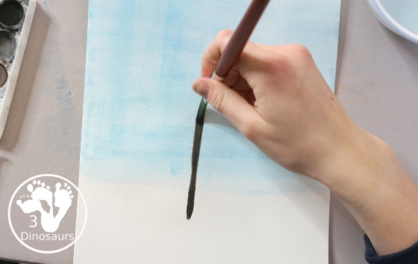 Winter Tree Painting Craft For Kids a fun mixed watercolor and q-tip painting winter tree for kids. A fun winter painting idea for kids that can do at different levels. - 3Dinosaurs.com