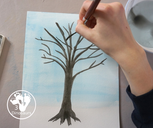 Winter Tree Painting Craft For Kids a fun mixed watercolor and q-tip painting winter tree for kids. A fun winter painting idea for kids that can do at different levels. - 3Dinosaurs.com