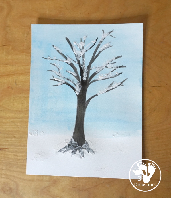 Winter Tree Painting Craft For Kids a fun mixed watercolor and q-tip painting winter tree for kids. A fun winter painting idea for kids that can do at different levels. - 3Dinosaurs.com