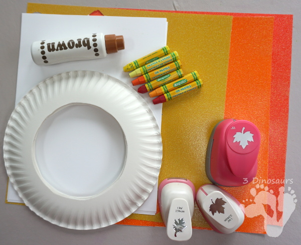 Fall Leaf Themed Wreath - fun wreath that kids can make with oil pastels and leaf punches - 3Dinosaurs.com 