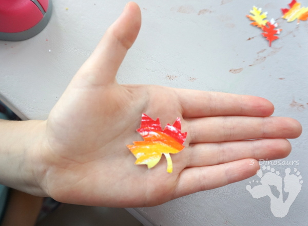 Fall Leaf Themed Wreath - fun wreath that kids can make with oil pastels and leaf punches - 3Dinosaurs.com 