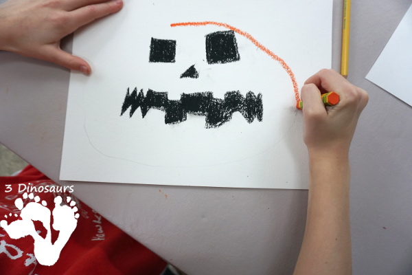 Watercolor Process Art Jack-O-Lantern - a fun Halloween painting activity to do with kids. It is great for kids that love to be creative and do things their own way - 3Dinosaurs.com 