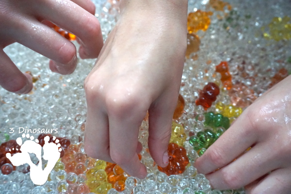 Pumpkin Water Beads Sensory Bin - fun sensory play with clear water beads and acrylic pumpkins make a fun sensory play for the fall - 3Dinosaurs.com