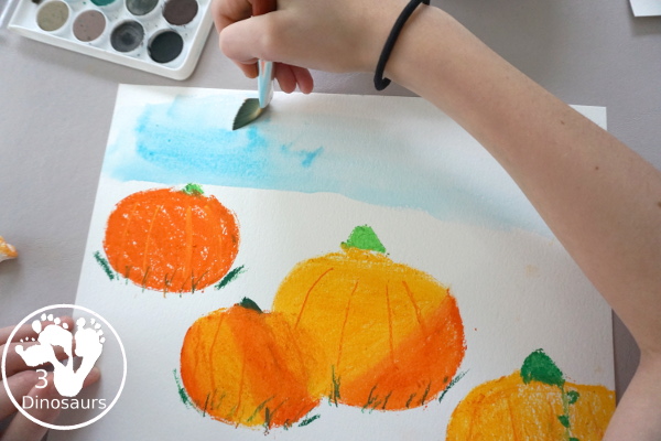 Jack-O-Lantern Patch Oil Pastel and Watercolor - a fun mixed art project for kids to do for Halloween! - 3Dinosaurs.com