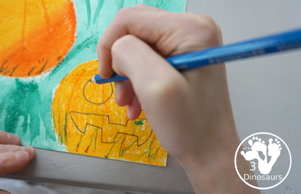 Jack-O-Lantern Patch Oil Pastel and Watercolor - a fun mixed art project for kids to do for Halloween! - 3Dinosaurs.com