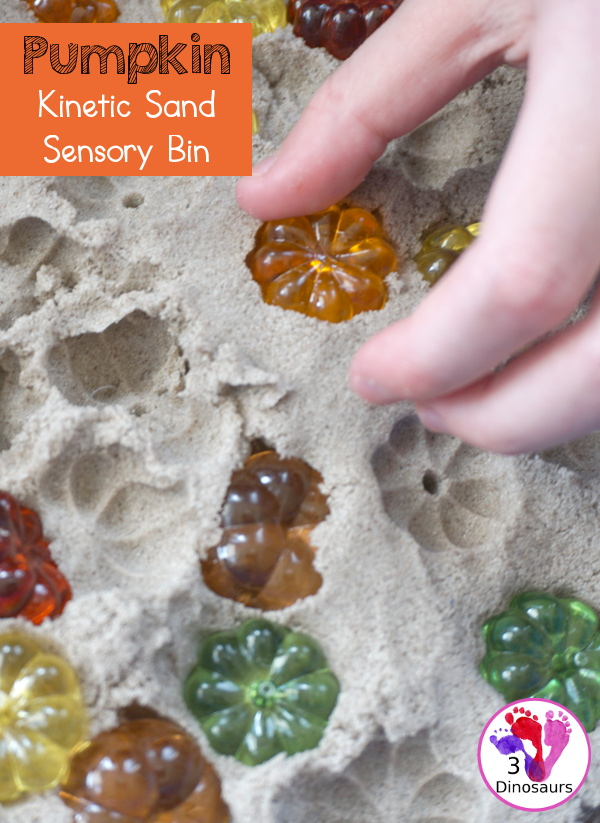 Pumpkin & Kinetic Sand Sensory Bin - a simple and easy fall sensory bin with pumpkins and kinetic sand for kids to play in. - 3Dinosaurs.com