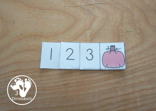 Free Pumpkin Spin & Write Place Value - You have 5 different spinners and 4 recording mats in color and black and white with place value from ones to Ones, Tens, Hundreds, Thousands, Ten Thousand, Hundred Thousands, Million, & Ten Million  - 3Dinosaurs.com