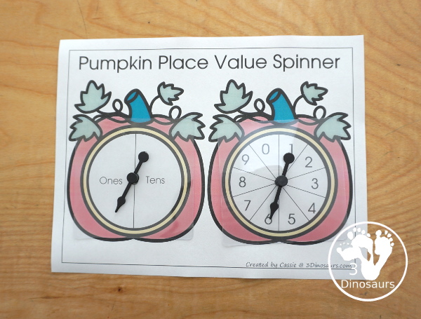 Free Pumpkin Spin & Write Place Value - You have 5 different spinners and 4 recording mats in color and black and white with place value from ones to Ones, Tens, Hundreds, Thousands, Ten Thousand, Hundred Thousands, Million, & Ten Million  - 3Dinosaurs.com