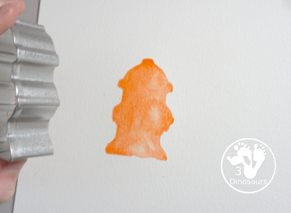 Fire Safety Cookie Cutter Watercolor Painting - a super simple painting activity you can do with kids of different ages. It is a great way to explore the different shapes that are in the cookie cutter sets - 3Dinosaurs.com