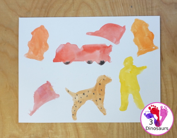 Fire Safety Cookie Cutter Watercolor Painting - a super simple painting activity you can do with kids of different ages. It is a great way to explore the different shapes that are in the cookie cutter sets - 3Dinosaurs.com