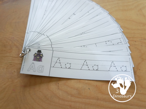 Free Halloween ABC Tracing Strips - with uppercase and lowercase together. You have fun kids with a haunted house, plus you can see an example of how to trace the letters - 3Dinosaurs.com