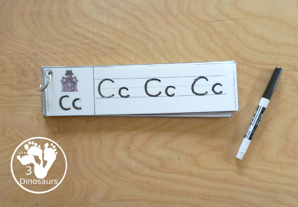 Free Halloween ABC Tracing Strips - with uppercase and lowercase together. You have fun kids with a haunted house, plus you can see an example of how to trace the letters - 3Dinosaurs.com