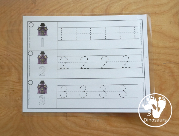 Free Halloween Number Tracing Strips - with numbers 0 to 20. A fun haunted house themed with a barn on each printable number tracing strip - 3Dinosaurs.com