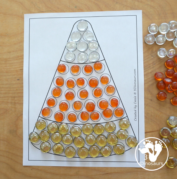 Free Candy Corn Fine Motor Mat Printables - You have candy corn printables, a candy corn tracing printable, and a candy corn dot marker printable.- 3Dinosaurs.com