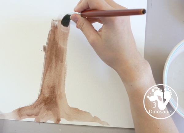 Fall Tree Scrape Painting with Leaf Cookie Cutters - a simple watercolor trunk and branches with leaf cookie cutter scrape painting. A great fall tree craft for kids. 3Dinosaurs.com