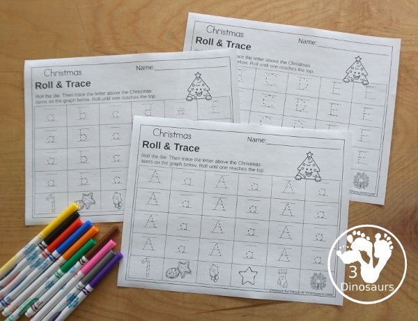 Christmas Roll & Graph With Trace Letters, Numbers & Shapes with a folding die and cube die with a graphing sheet, graphing with tracing numbers, graphing with tracing letters and graphing with tracing shapes. All with a fun holiday theme for Christmas for prek and kindergarten - 3Dinosaurs.com