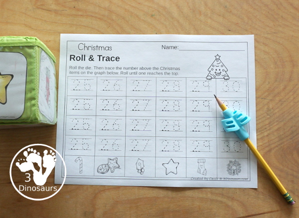 Christmas Roll & Graph With Trace Letters, Numbers & Shapes with a folding die and cube die with a graphing sheet, graphing with tracing numbers, graphing with tracing letters and graphing with tracing shapes. All with a fun holiday theme for Christmas for prek and kindergarten - 3Dinosaurs.com