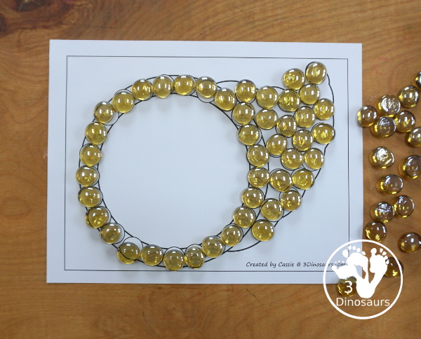 Free Cornucopia Fine Motor Mat Printables - you have five pages of printables with cornucopia templates, a cornucopia tracing page, a cornucopia dot marker page, and a cornucopia q-tip page. A fun Thanksgiving fine motor mat for kids. - 3Dinosaurs.com