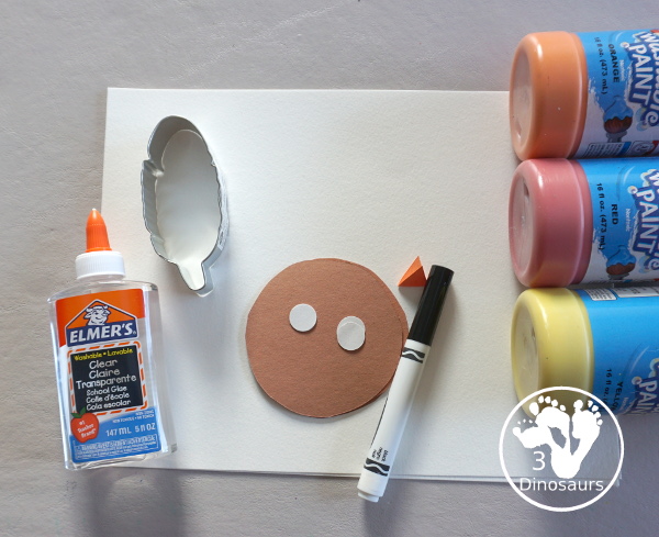 Turkey Feather Scrap Painting for Kids - a fun turkey craft made with a cookie cutter feather and construction paper. A fun painting idea with feathers for a Thanksgiving craft for kids in preschool, prek, and kindergarten. 3Dinosaurs.com