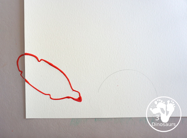 Turkey Feather Stamp Painting for Kids - a fun turkey craft made with a cookie cutter feather and construction paper. A fun idea for a Thanksgiving craft for kids in preschool, prek, and kindergarten. 3Dinosaurs.com