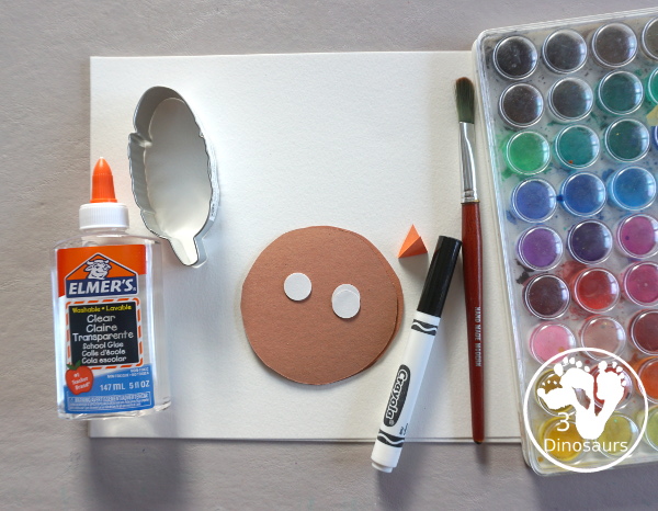 Turkey Feather Watercolor Painting for Kids - a fun turkey craft made with a cookie cutter feather and construction paper. A fun watercolor painting idea with feathers for a Thanksgiving craft for kids in preschool, prek, and kindergarten. 3Dinosaurs.co