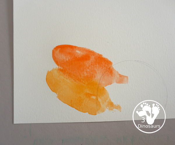 Turkey Feather Watercolor Painting for Kids - a fun turkey craft made with a cookie cutter feather and construction paper. A fun watercolor painting idea with feathers for a Thanksgiving craft for kids in preschool, prek, and kindergarten. 3Dinosaurs.co