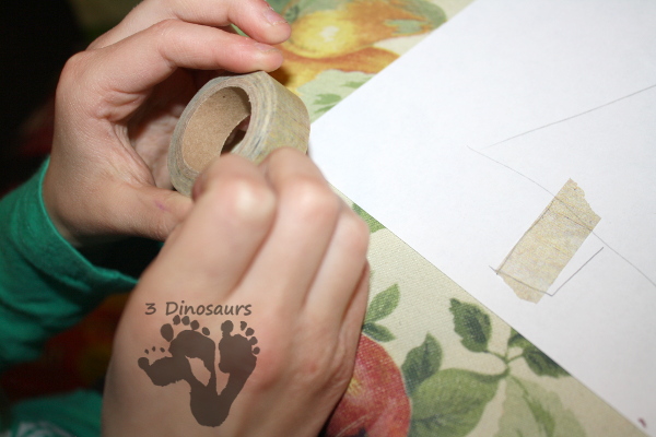 Easy Fine Motor Washi Tape Christmas Tree - a fun way to make a Christmas tree with washi tape - 3Dinosaurs.com