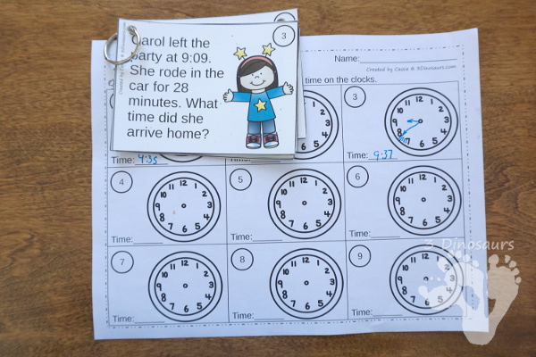 Free New Years Clock Task Cards -  2 levels of cards with matching worksheets. - 3Dinosaurs.com #printablesforkids #tellingtime #newyearsprintables #freeprintables