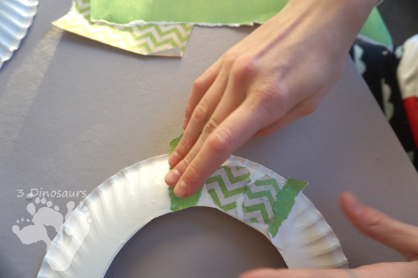 Torn Scrapbook Paper Holly Wreath - a simple and easy fine motor craft for kids to make at Christmas time - 3Dinosaurs.com