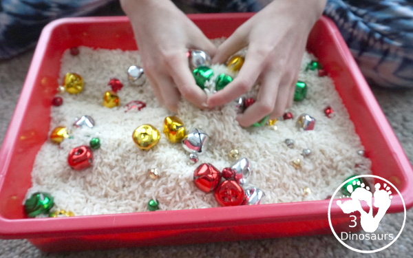 Jingle Bell Sensory Bin - a fun way to do activities with bells and sensory play at the same time. Easy to set up and use for Christmas time. - 3Dinosaurs.com