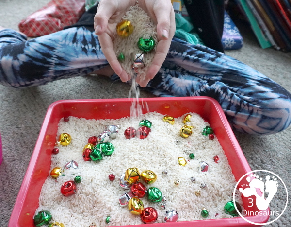 Jingle Bell Sensory Bin - a fun way to do activities with bells and sensory play at the same time. Easy to set up and use for Christmas time. - 3Dinosaurs.com