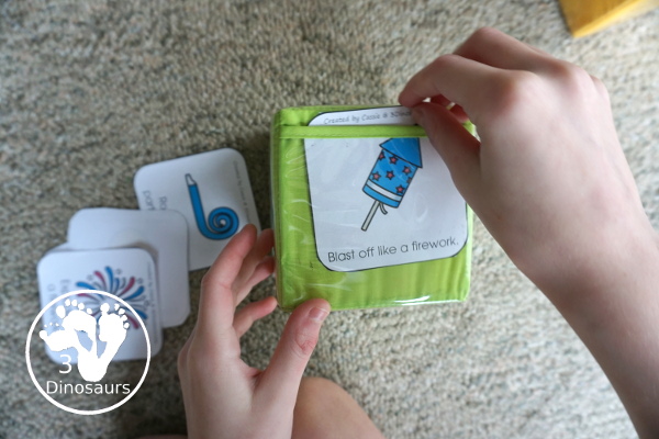 Free New Year Gross Motor Dice - to get kids moving and have fun with easy gross motor movements and fun way to remember parts of the New Years with clocks, fireworks, and more - 3Dinosaurs.com