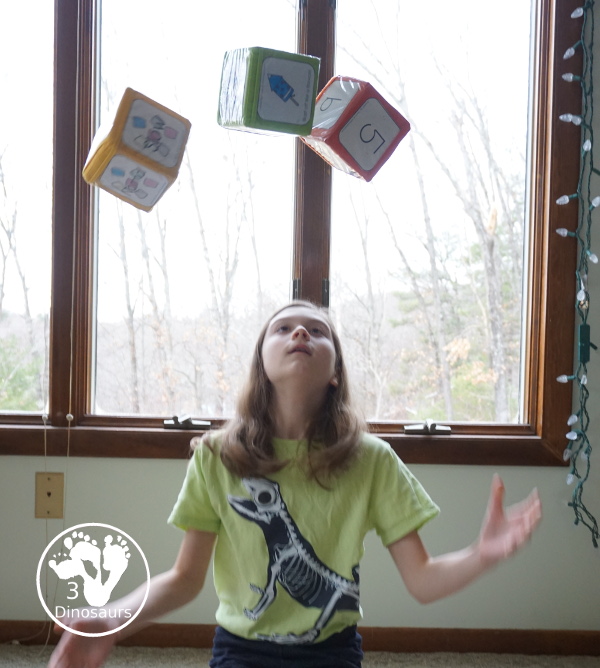 Free New Year Gross Motor Dice - to get kids moving and have fun with easy gross motor movements and fun way to remember parts of the New Years with clocks, fireworks, and more - 3Dinosaurs.com